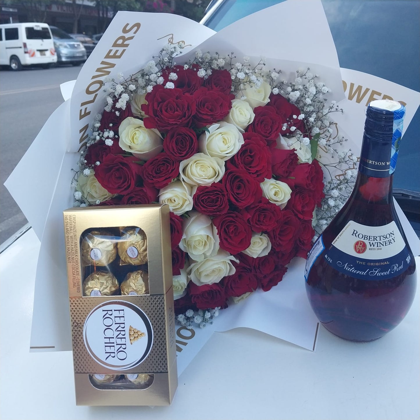 RED & WHITE ROSES WITH WINE & FERRERO ROCHER CHOCOLATES