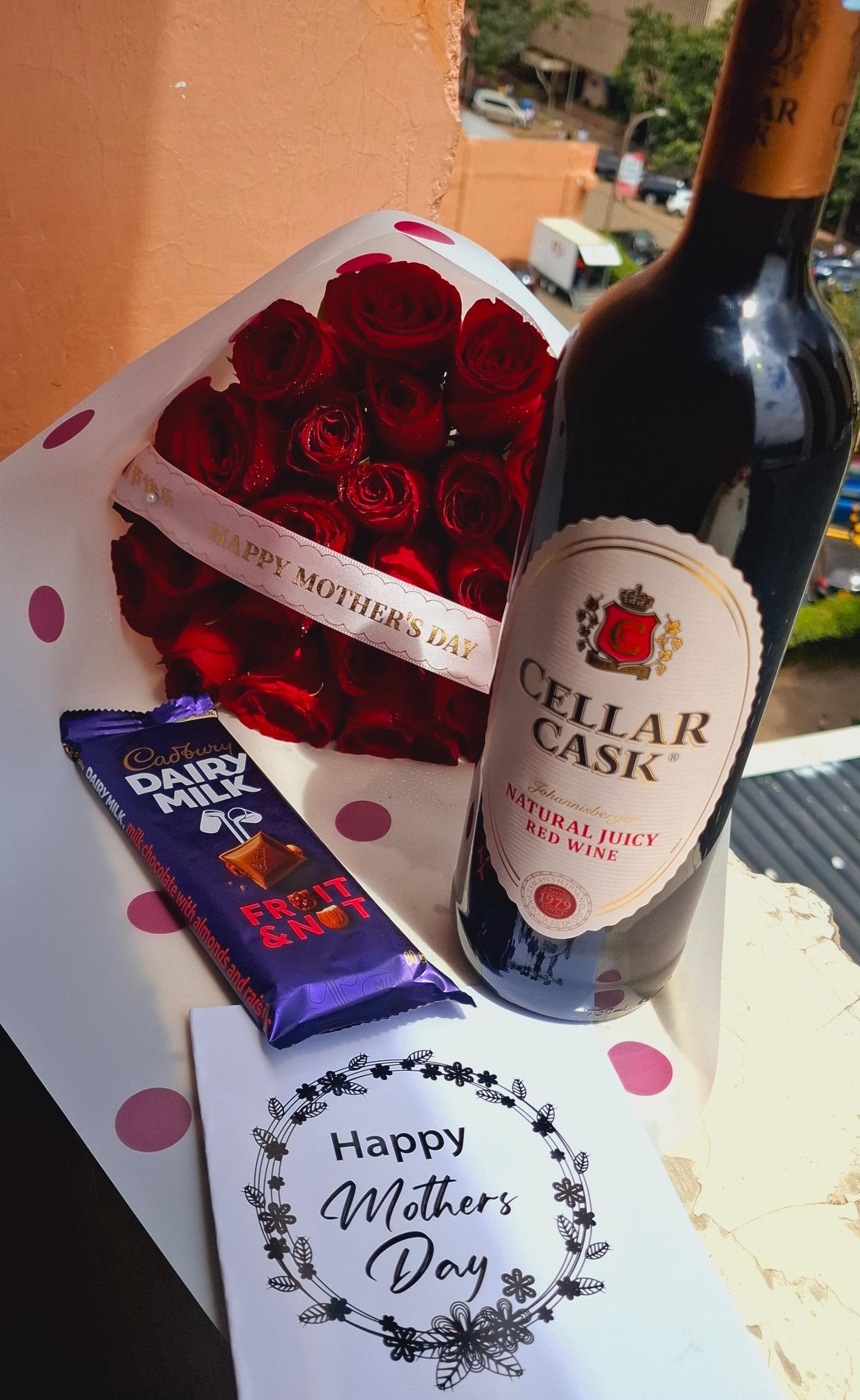 FLOWERS, CELLAR CASK WINE & A CHOCOLATE BAR