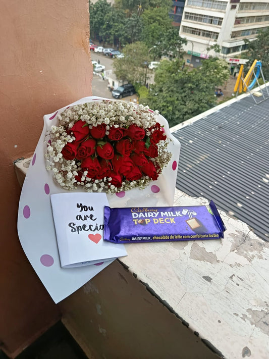 RED ROSES & ALARGE CADBURY CHOCOLATE