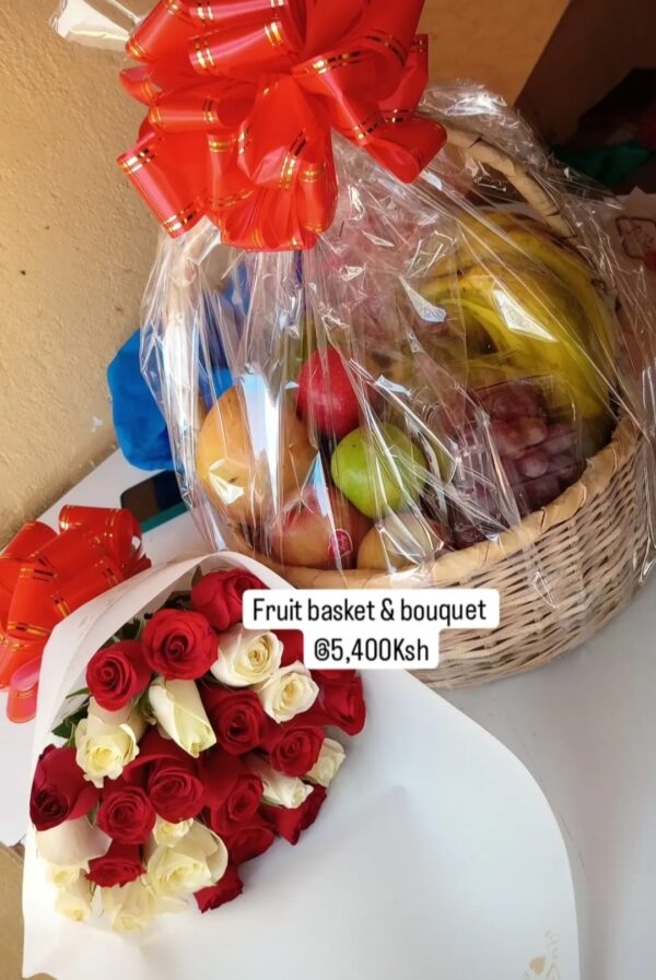 ASSORTED FRUIT BASKET WITH A BOUQUET OF FLOWERS
