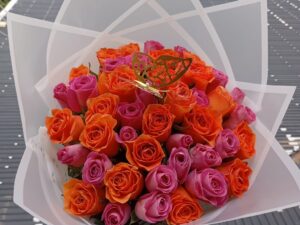 ORANGE & PINK ROSES WITH A BUTTERFLY