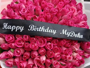 100 PINK ROSES WITH CUSTOMISED RIBBON