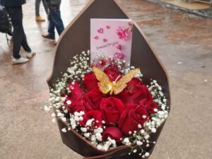 20 RED ROSES WITH BABY BREATH & A BUTTERFLY