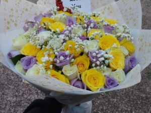 WHITE, PURPLE AND YELLOW MIXED ROSES