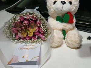 PINK ROSES WITH A MINI TEDDY
