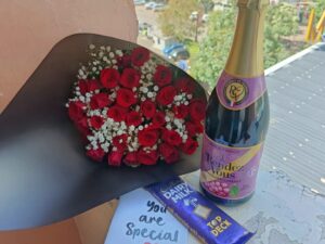 RED ROSES WITH BABY BREATH, NON-ALCOHOLIC WINE & CHOCOLATE