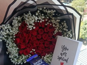 40 RED ROSES WITH BABY BREATH & CADBURY CHOCOLATE