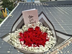 RED ROSES WITH BABY BREATH