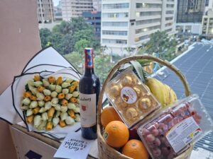 60 RED ROSES  WITH A FRUIT BASKET, WINE & CHOCOLATE