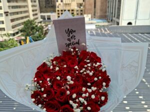 RED ROSES WITH BABY BREATH